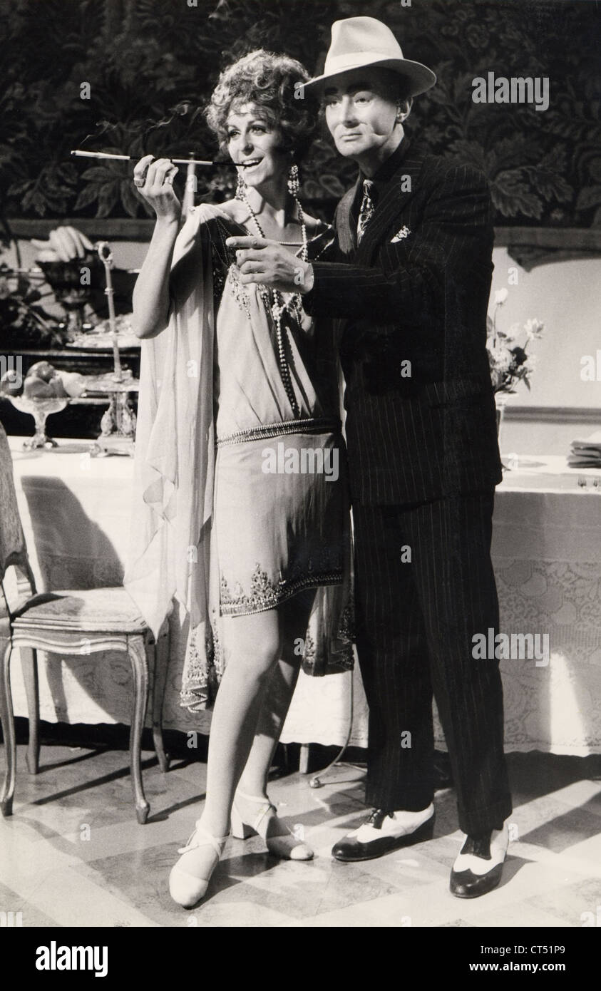 Ros Drinkwater and Francis Mattews during filming of Paul Temple. 52 part BBC TV series c.1970 Stock Photo