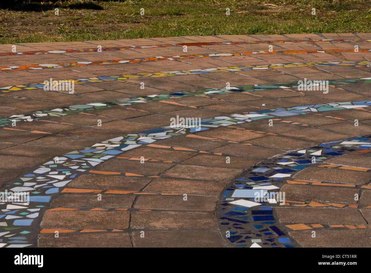 Coloured tile pattern in circular paving Stock Photo
