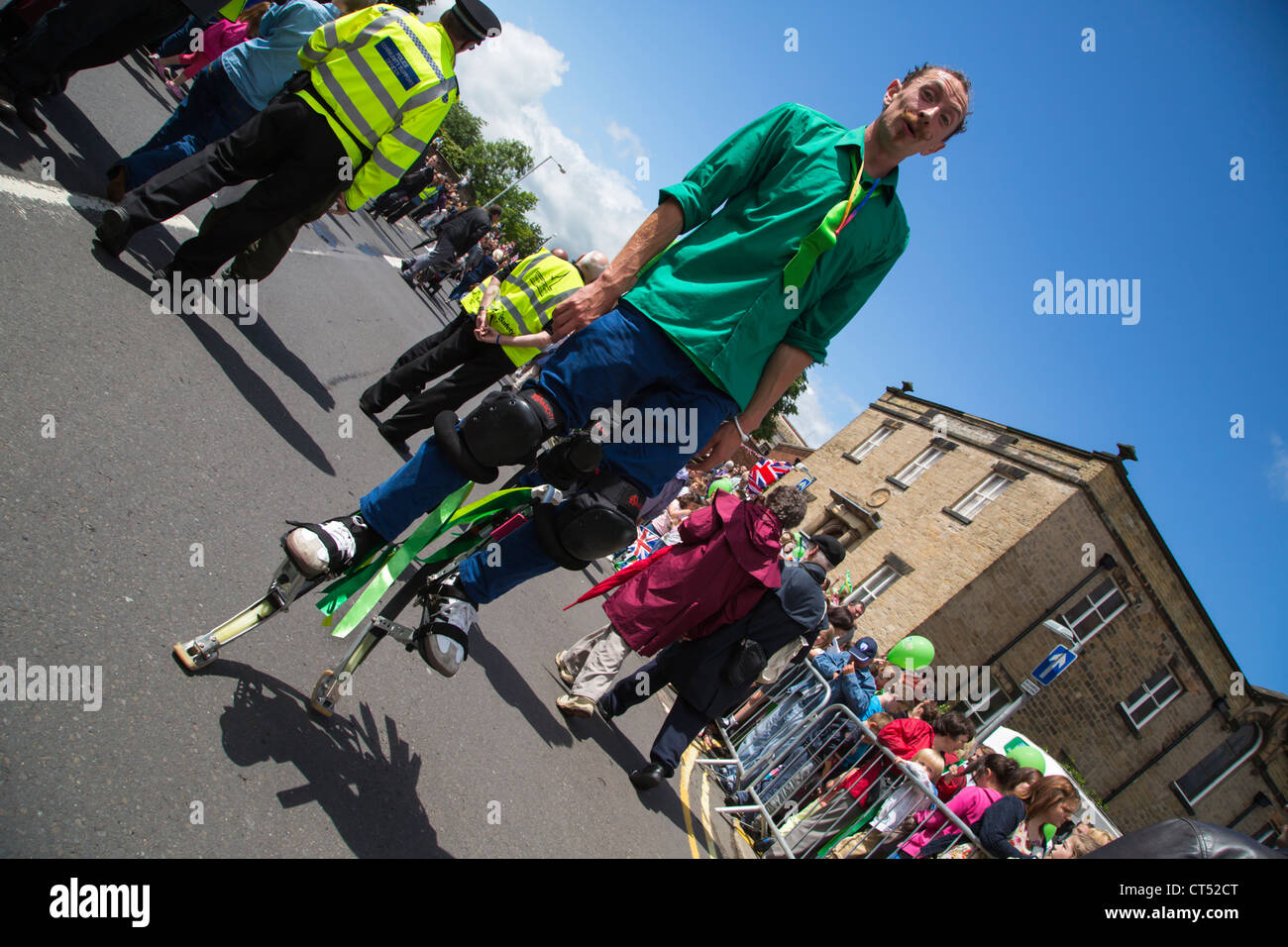 Man walking on stilts hires stock photography and images Alamy