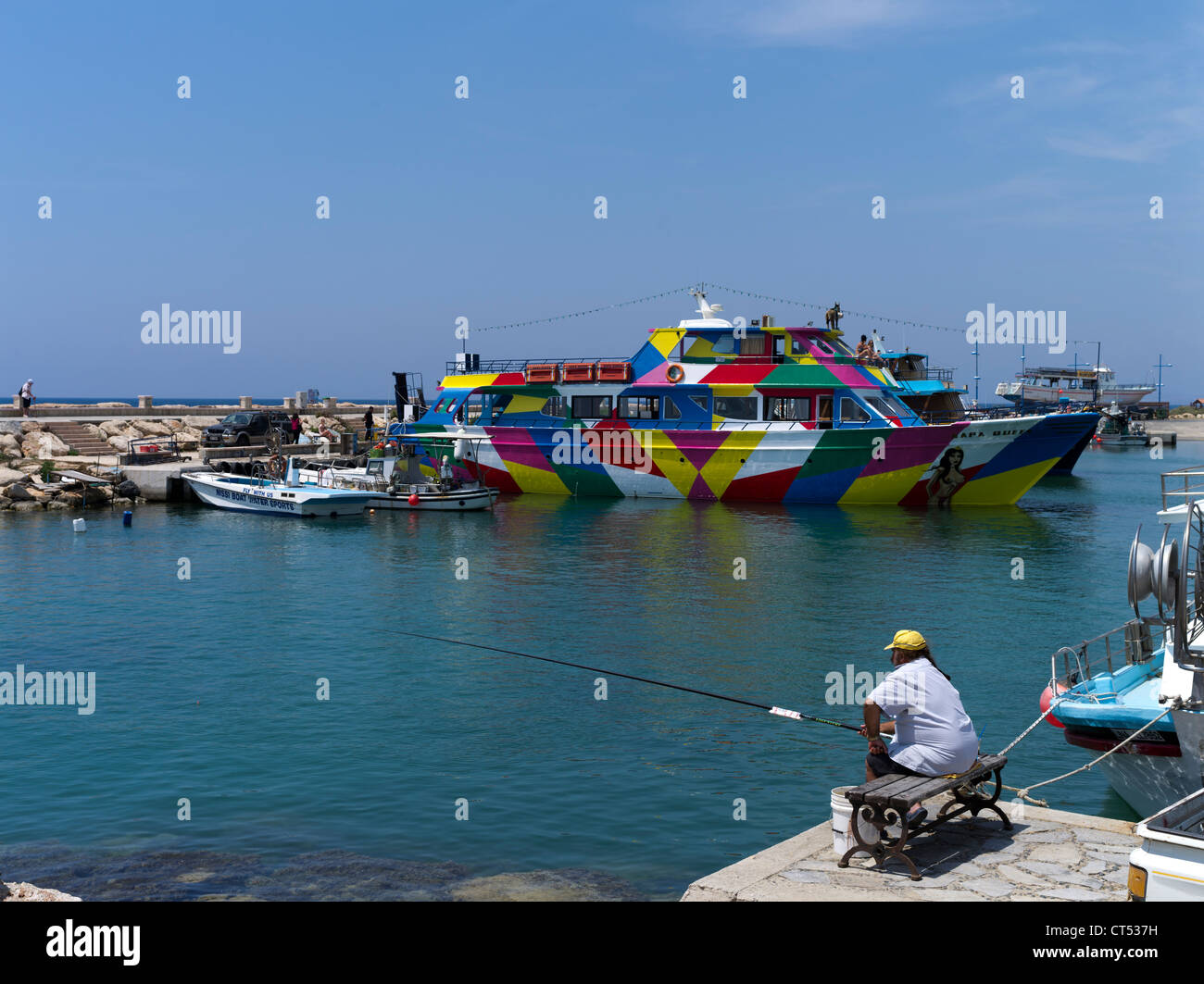 dh Liminaki harbour AYIA NAPA CYPRUS Cypriot angler fishing Tourist holiday party cruise boat people fish Stock Photo