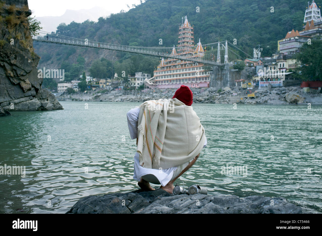 A pilgrim at the Ganges in Rishikesh, India. Stock Photo