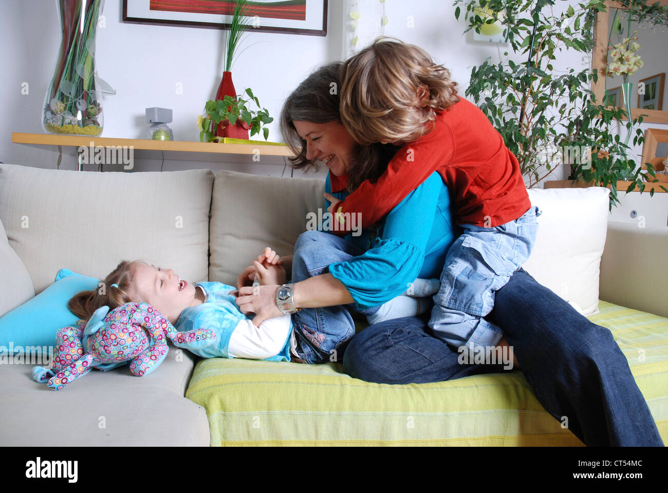 FAMILY INDOORS Stock Photo - Alamy