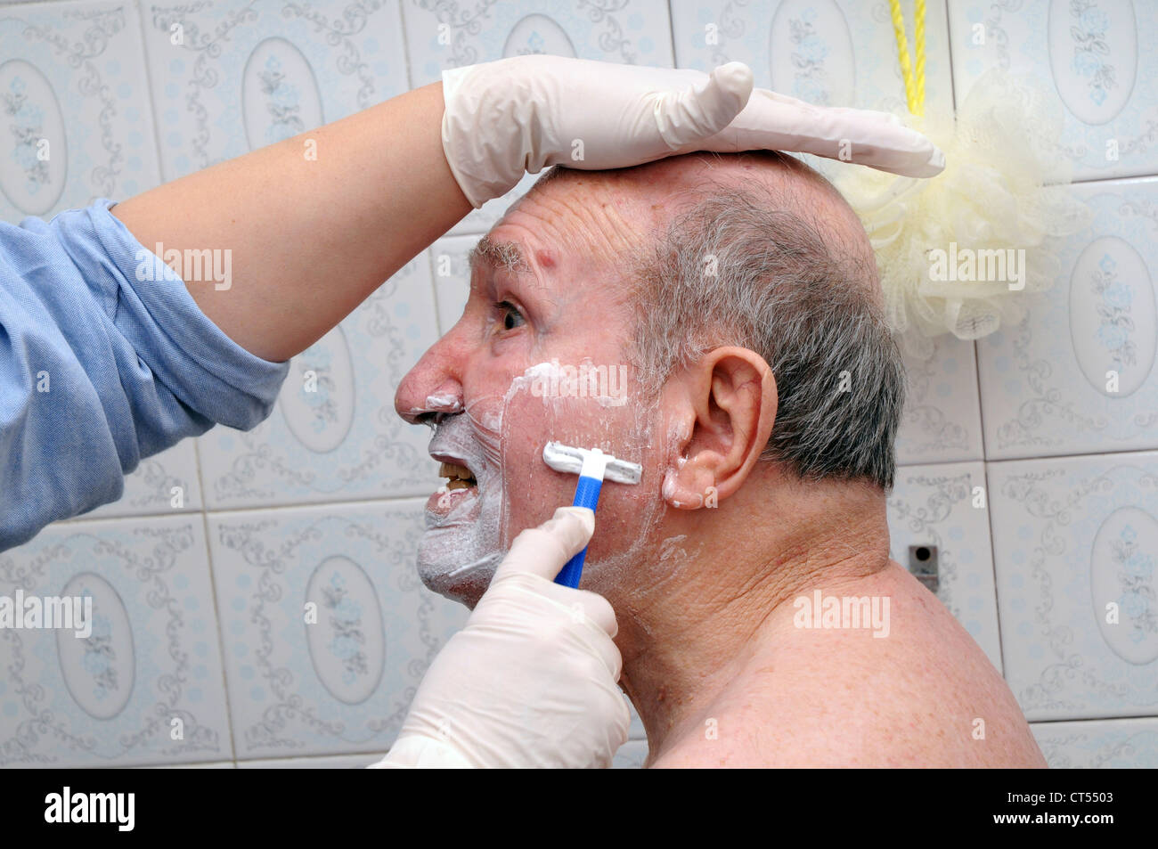 NURSE WASHING ELDERLY PERSON Stock Photo Alamy
