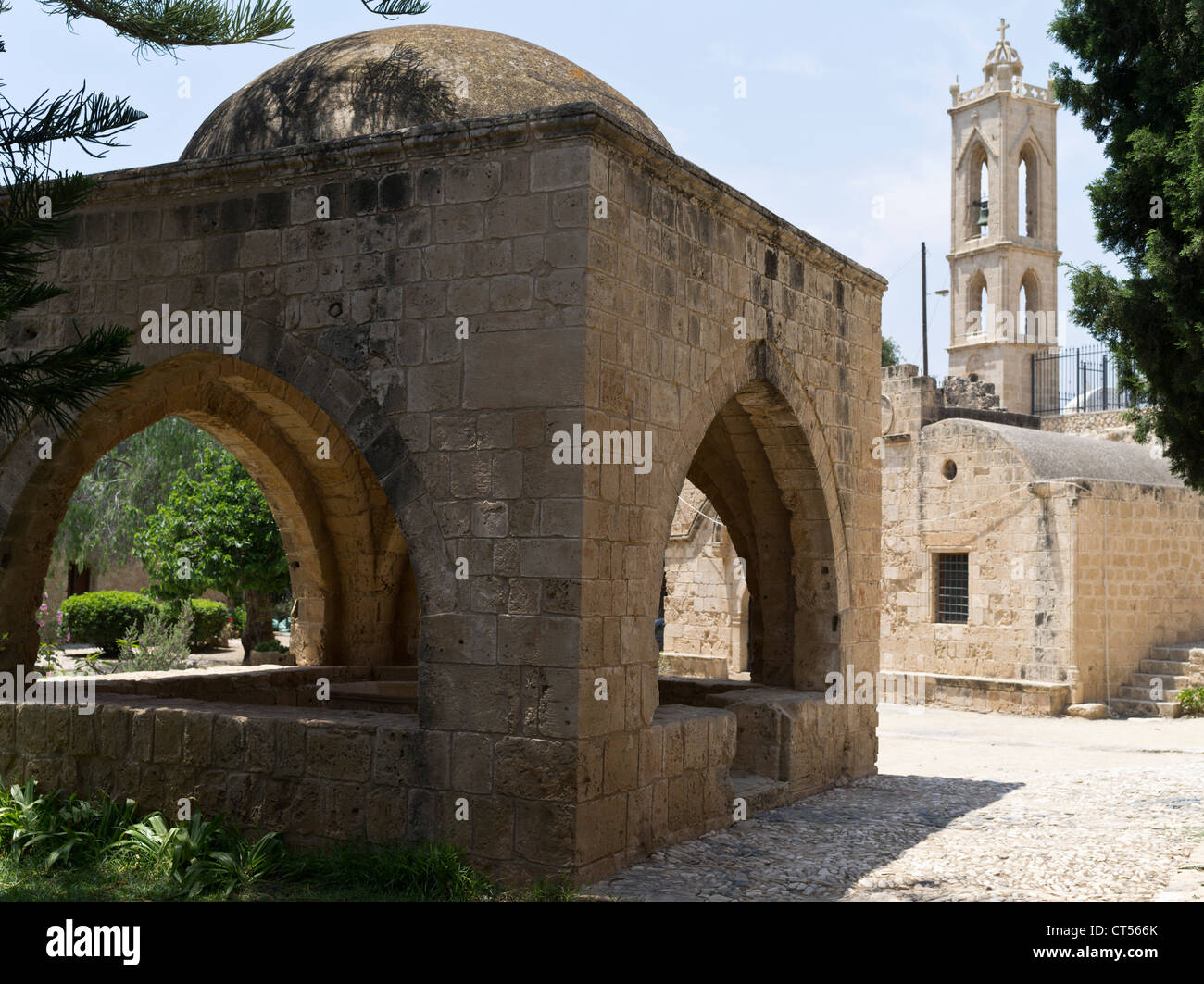 dh Agia Napa Monastery AYIA NAPA CYPRUS Venetian monastery fountain house well and Orthodox church bell tower greek Stock Photo