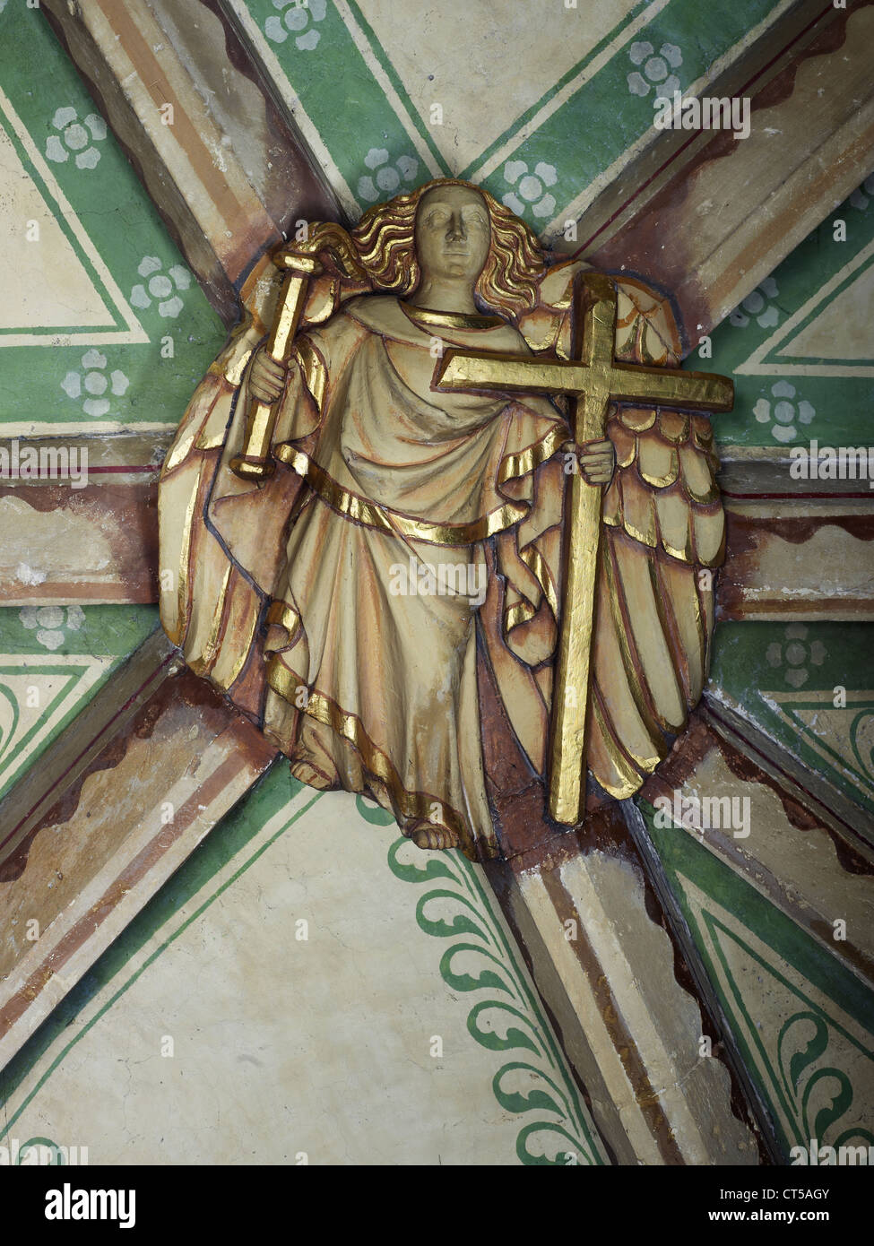 Tewkesbury Abbey, angel with cross. Nave roof boss Stock Photo