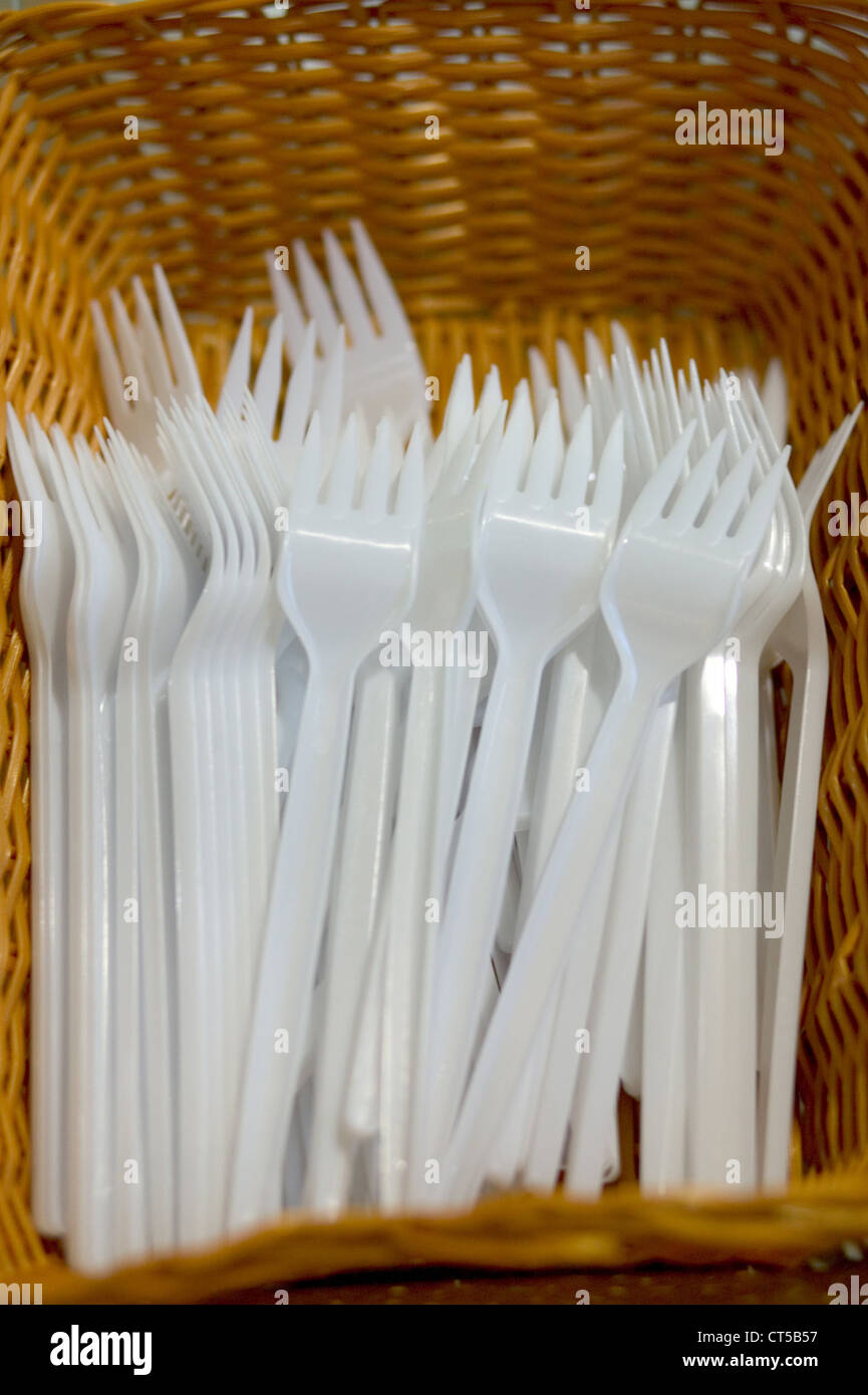 White plastic forks in a basket Stock Photo Alamy