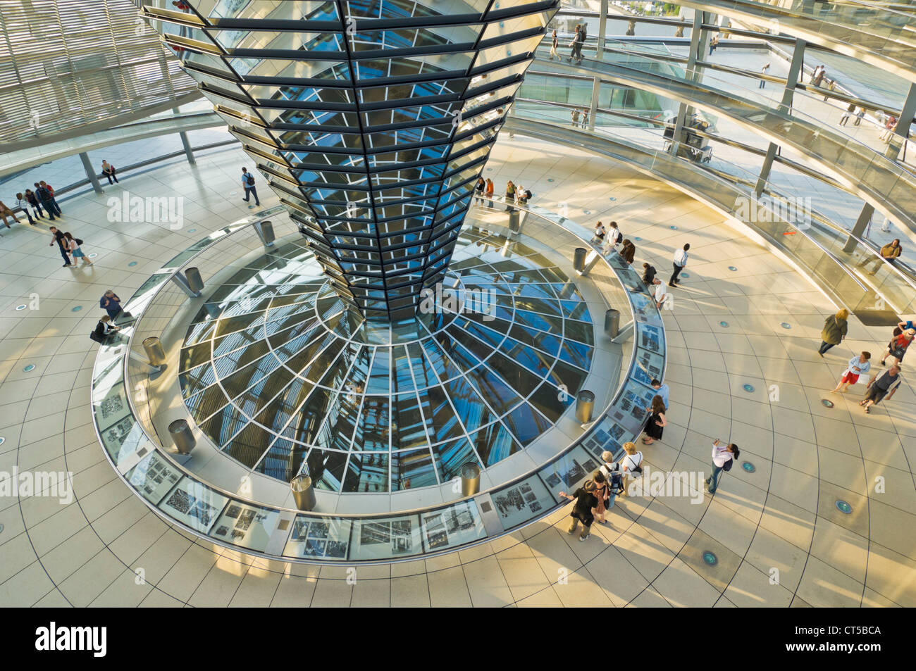 Glass dome and mirrored central glass funnel above the Plenary chamber of the Reichstag building Berlin Germany EU Europe Stock Photo