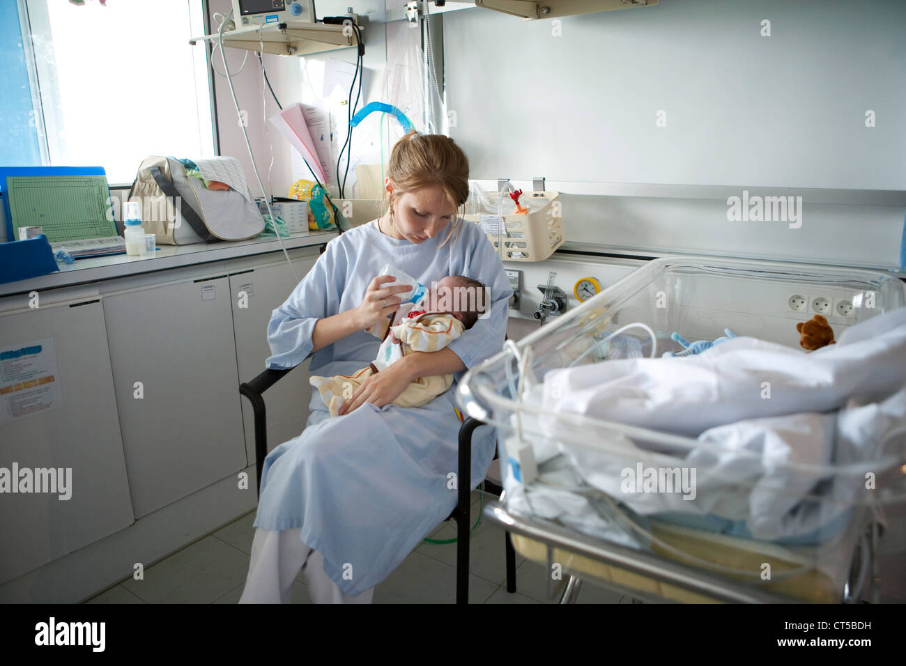 PREMATURE BABY WITH BABY BOTTLE Stock Photo - Alamy