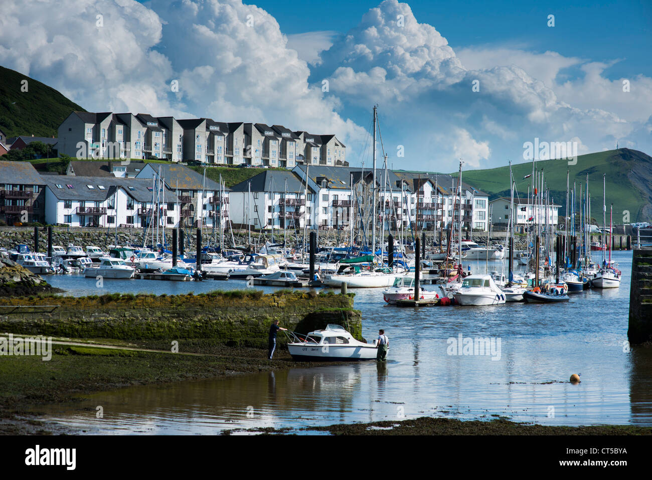 A Summer afternoon, blocks of apartments and flats overlooking boats