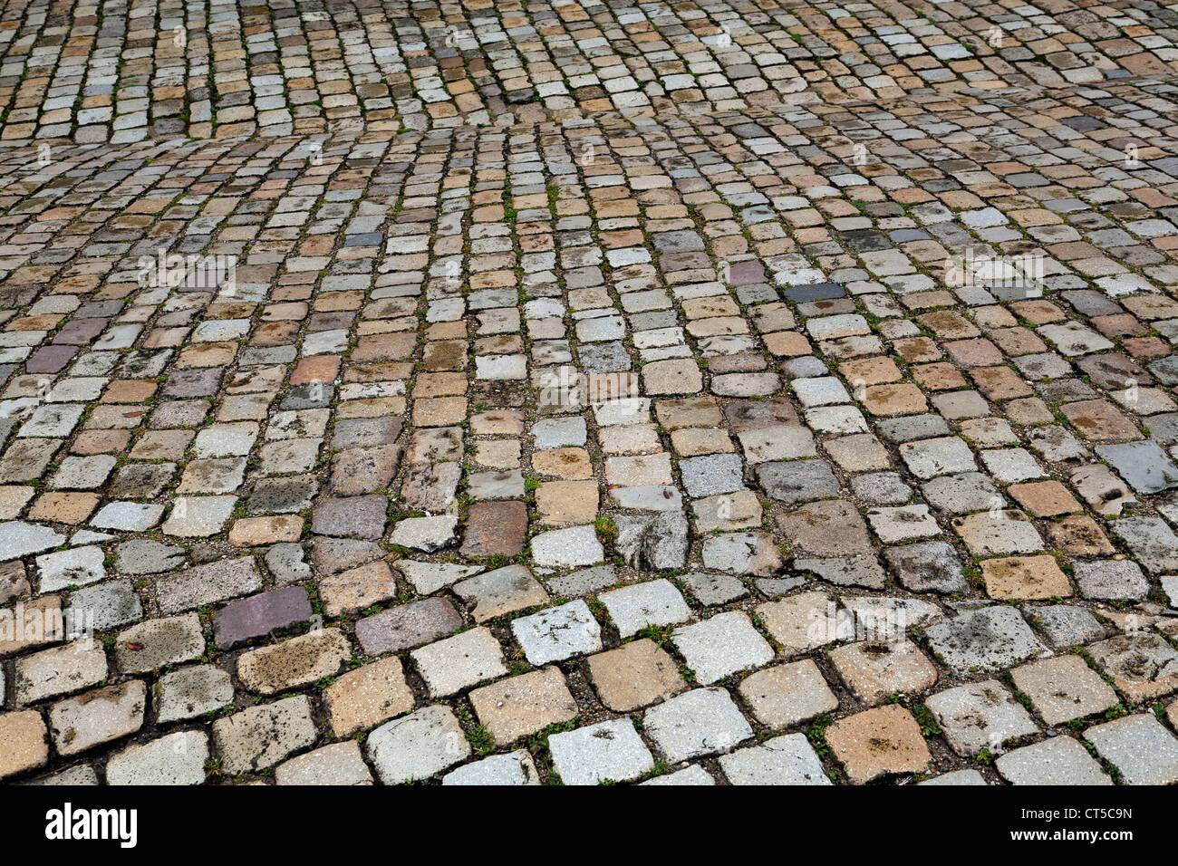 Cobbled street in front of the church of Notre Dame de Roscudon, Pont Croix, Brittany Stock Photo