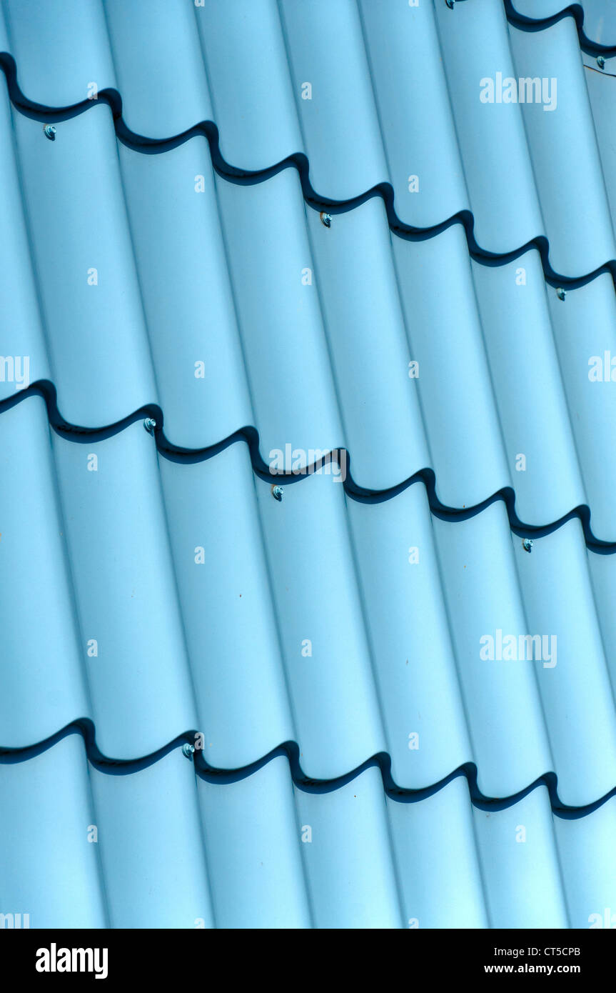 Vertical ridged blue painted metal wall texture Stock Photo