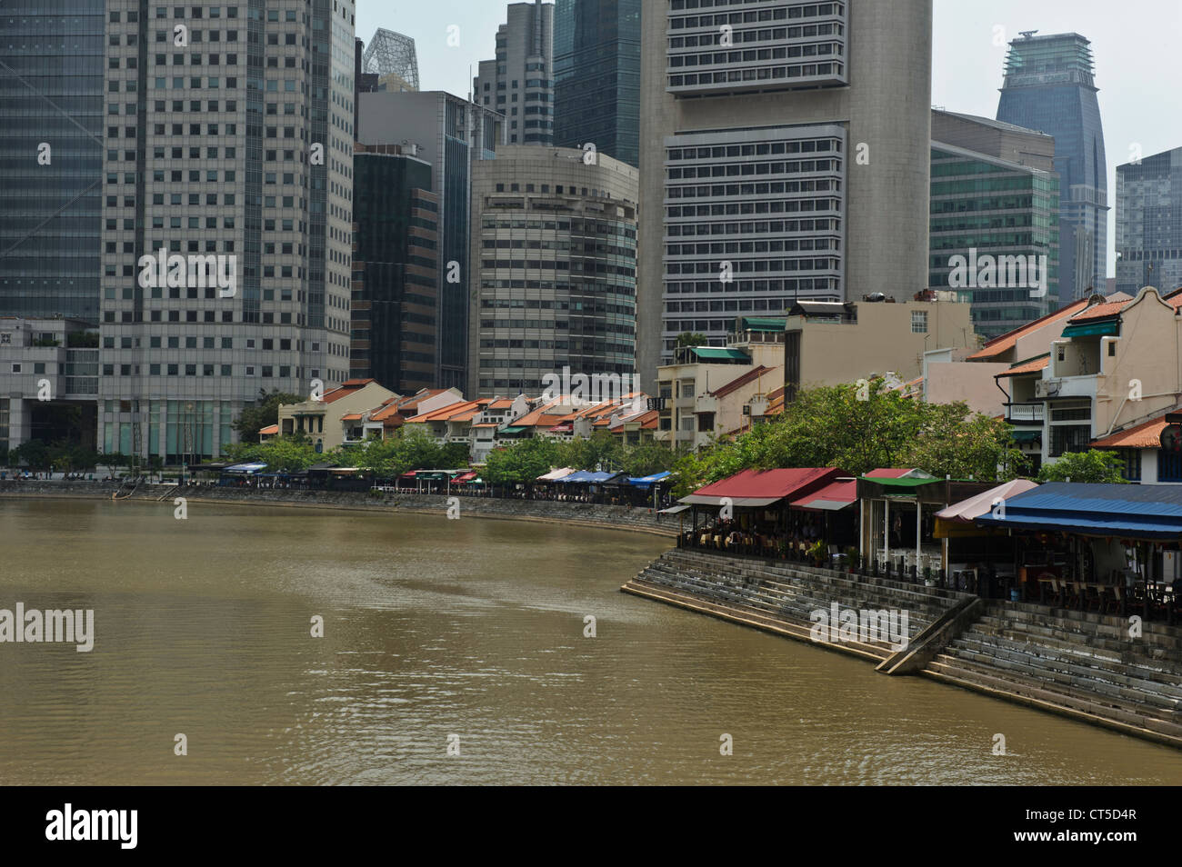 Boat Quay by the river with financial district in background, Singapore, Southeast Asia. Stock Photo
