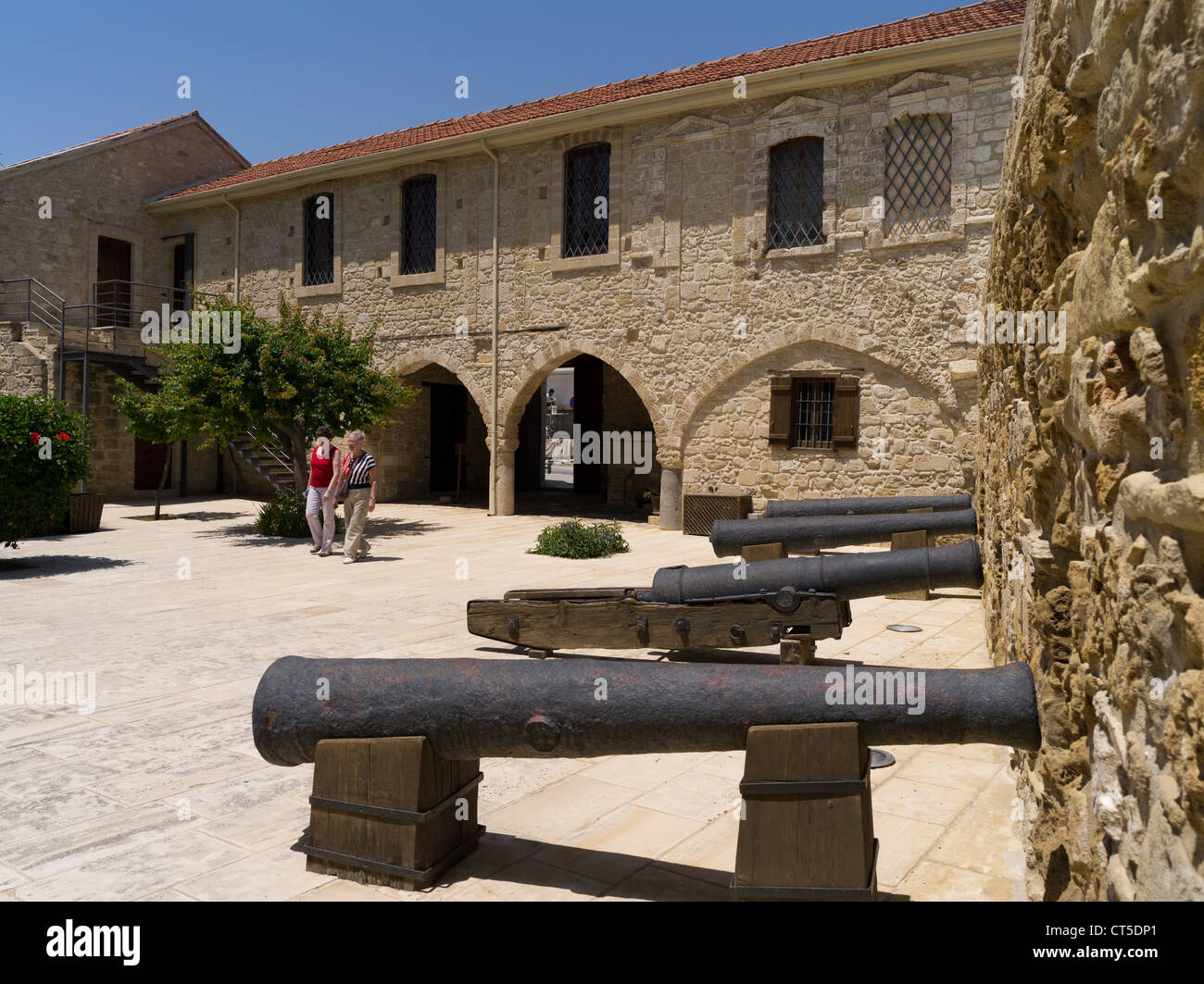 dh Larnaka fort LARNACA CYPRUS Building Local Mediaeval Museum courtyard tourists old canon castle tourism attractions women people greek island Stock Photo