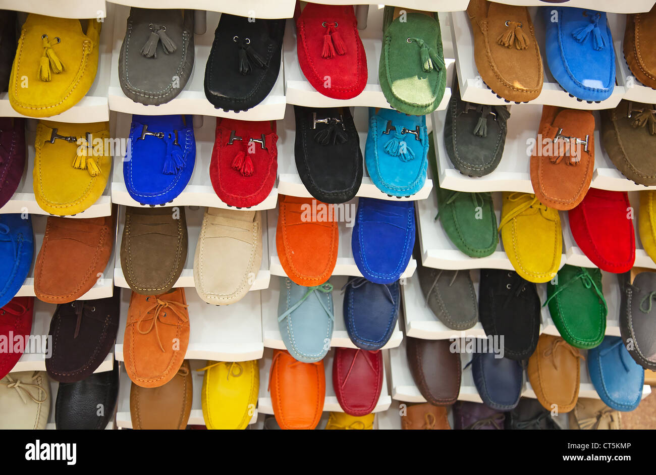 variety of the colorful leather shoes in the shop Stock Photo - Alamy