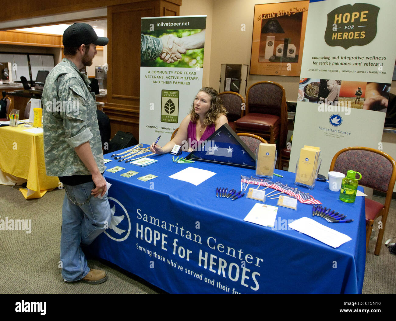 United States military veterans attend a job fair at the Texas Capitol in Austin, Texas following a parade in their honor Stock Photo