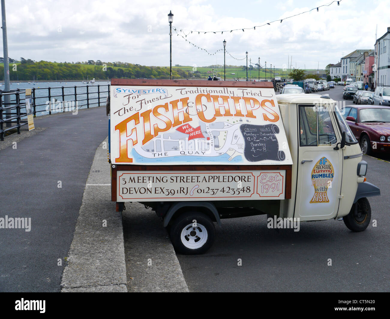 Three wheel vehicle advertising fish and chip shop at Appledore Devon