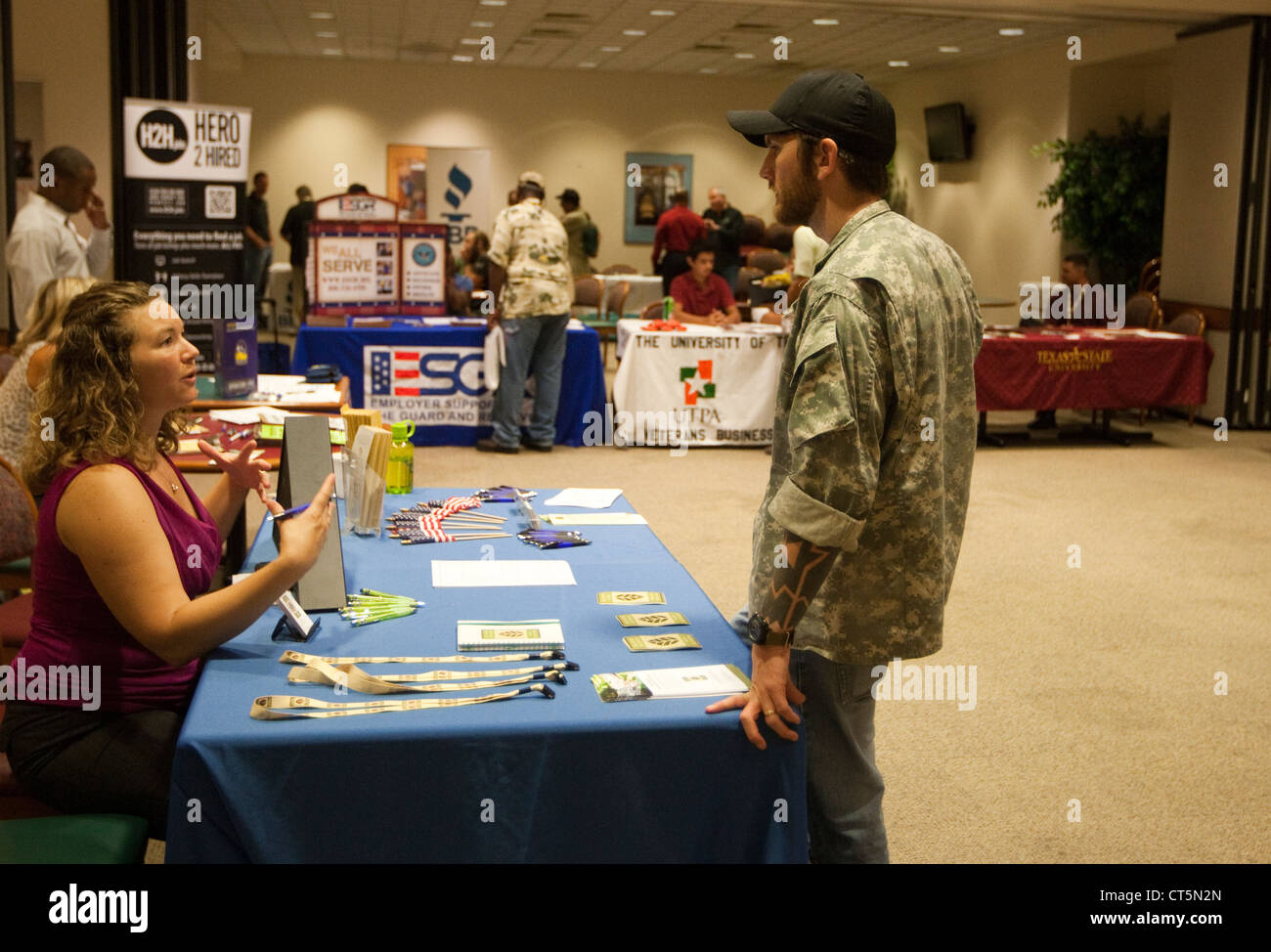 United States military veterans attend a job fair at the Texas Capitol in Austin, Texas following a parade in their honor Stock Photo