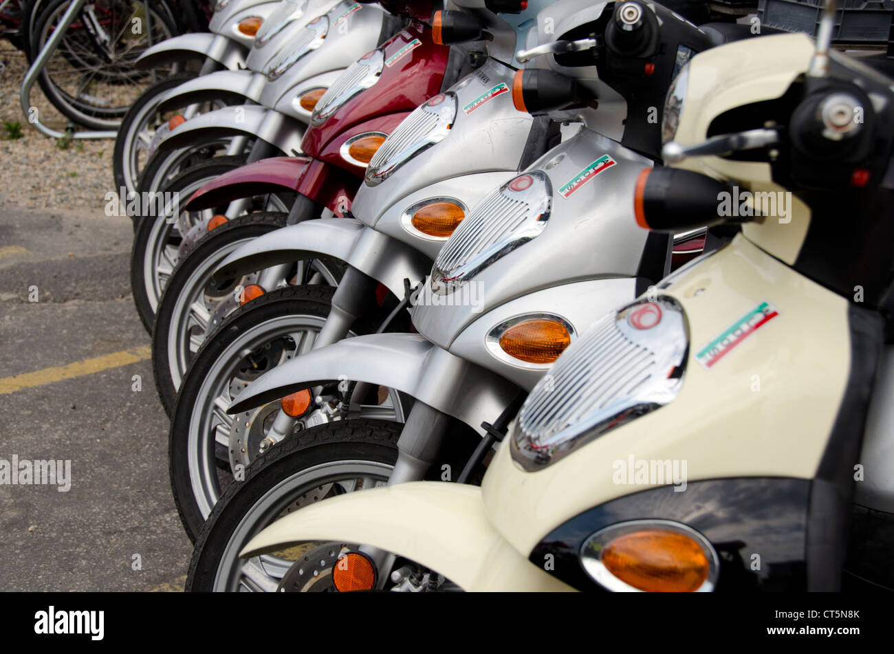 Rhode Island, Block Island. Motor scooters lined up ready for rental