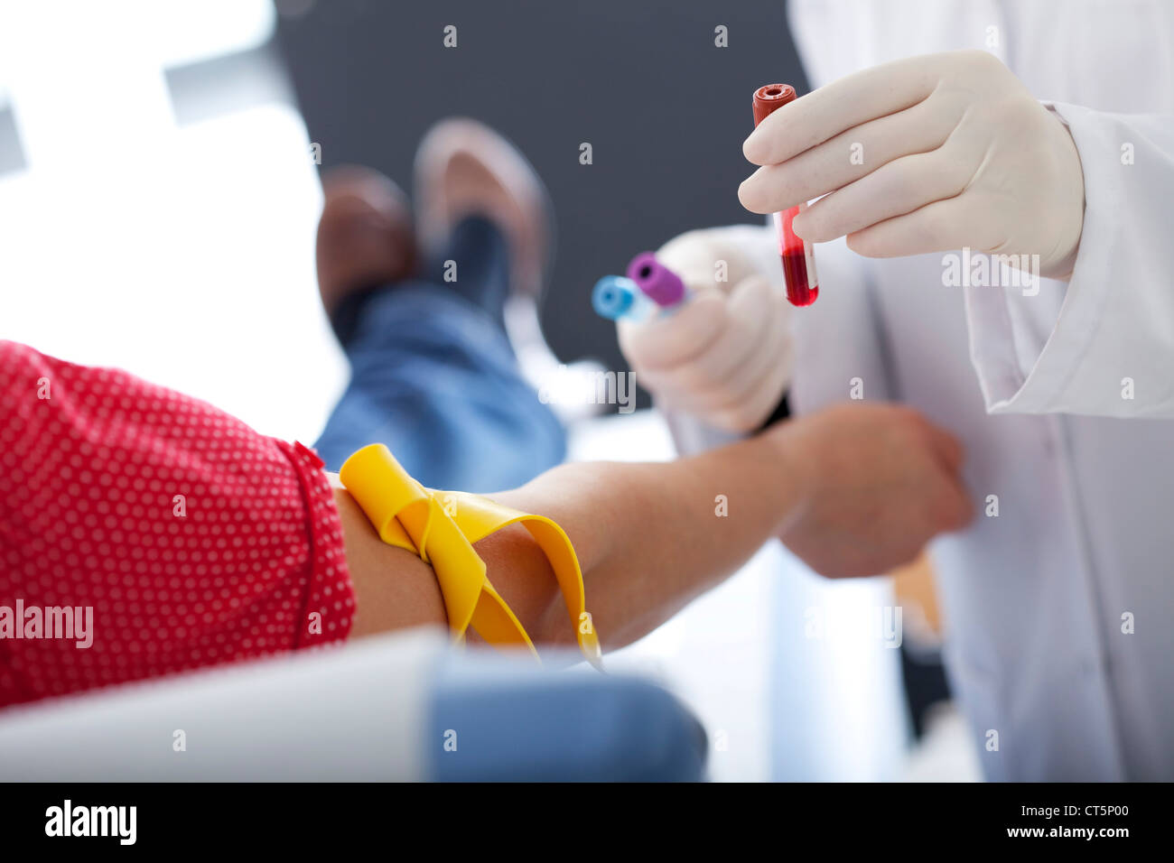 BLOOD SPECIMEN IN A WOMAN Stock Photo - Alamy
