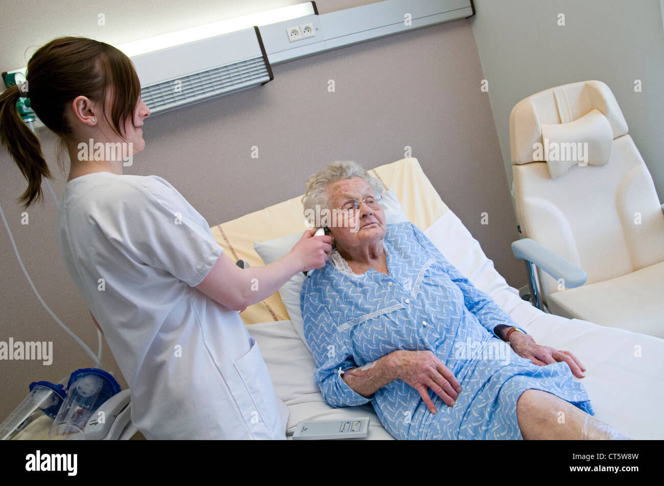 TEMPERATURE ELDERLY PERSON Stock Photo Alamy