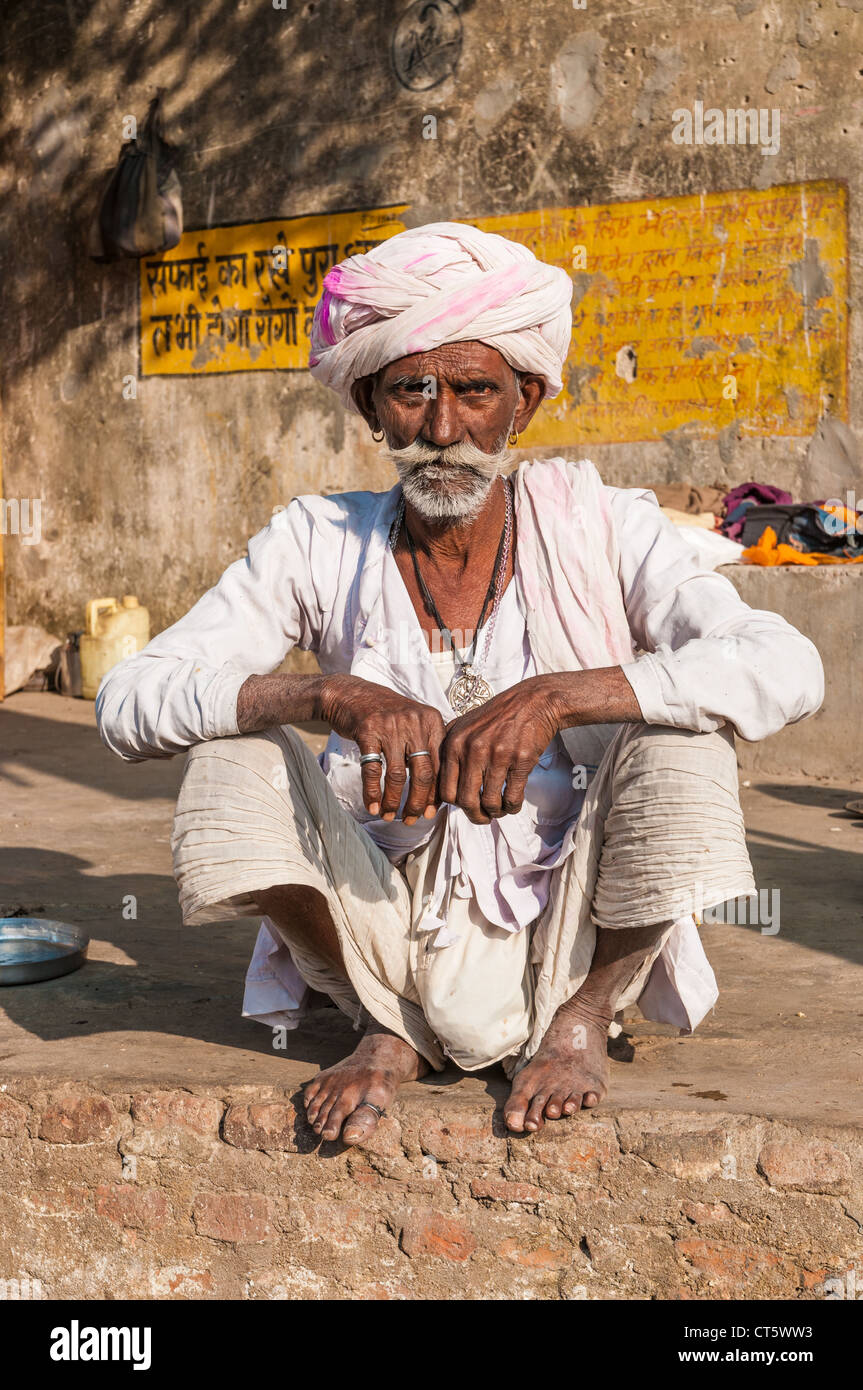 An old Indian man sitting with a turban and beard, Rajasthan, India ...