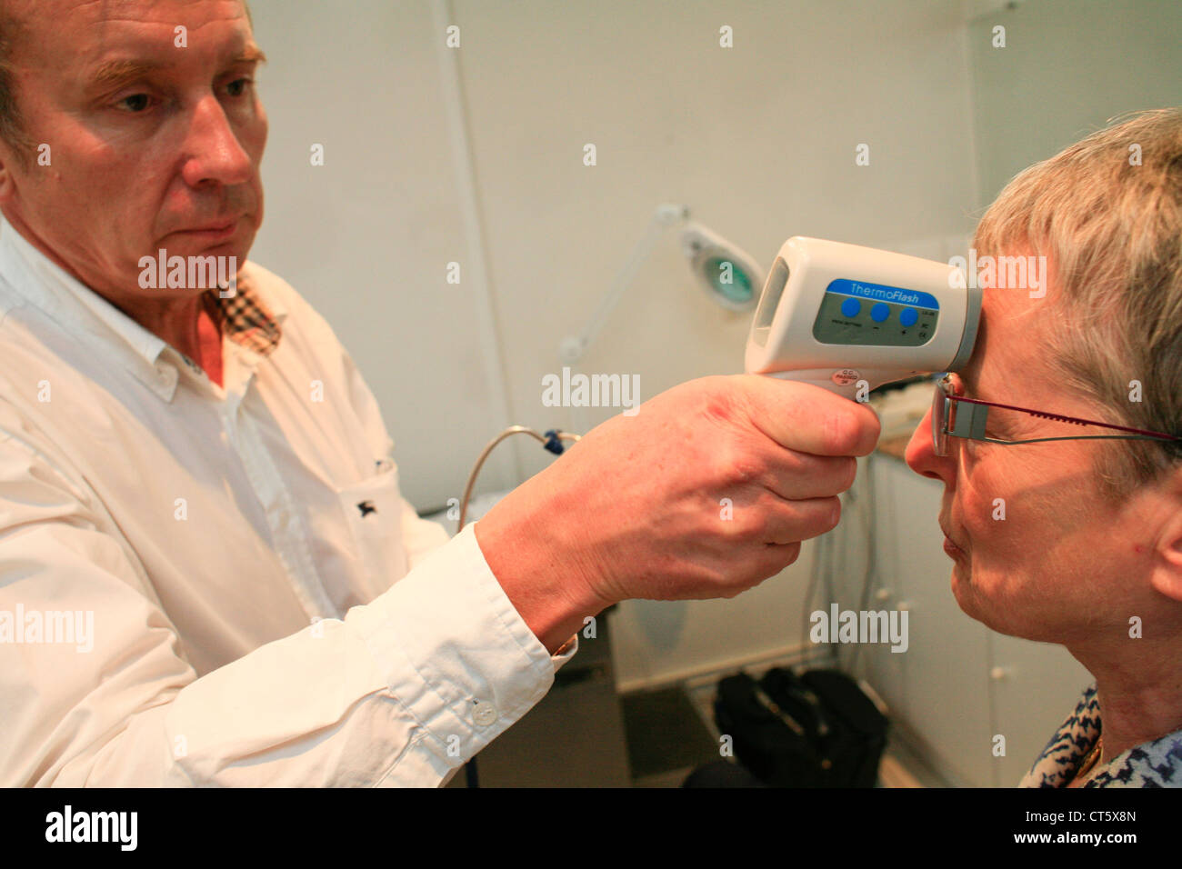 TEMPERATURE ELDERLY PERSON Stock Photo Alamy