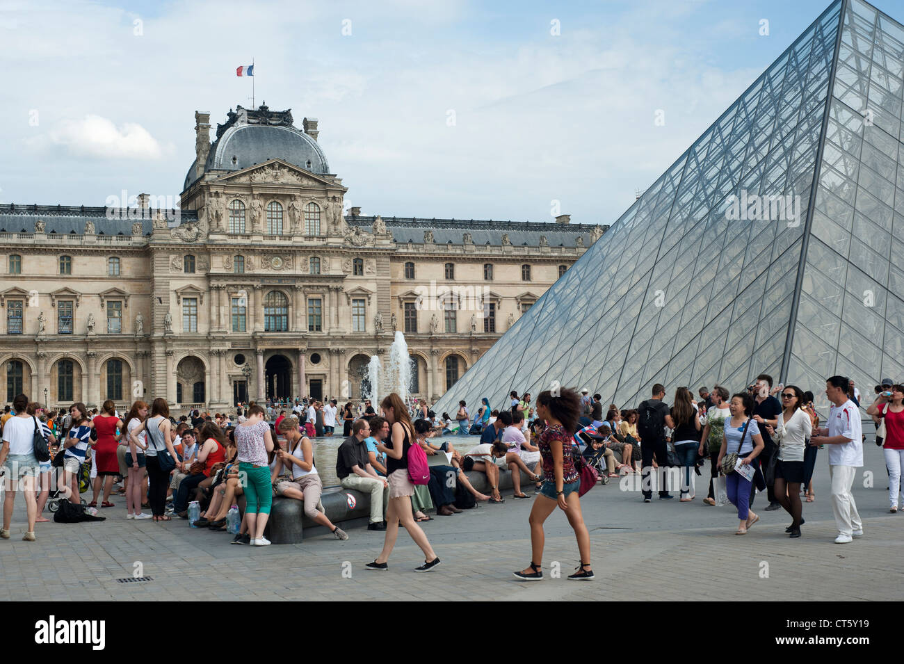 Paris, France - Tourists around the Louvre. Stock Photo