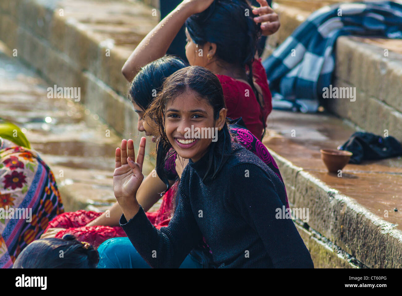 Indian teenager when he bathed in the river Ganges, Varanasi, Uttar Pradesh, India Stock Photo