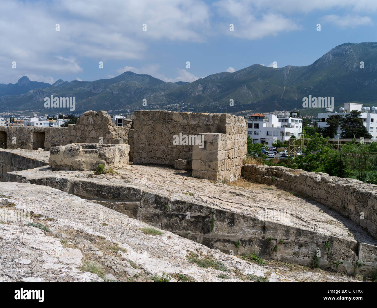 dh Girne Castle KYRENIA NORTHERN CYPRUS Venetian castle walls Kyrenia town and Besparmak mountains wall defences defence venitian fortification Stock Photo