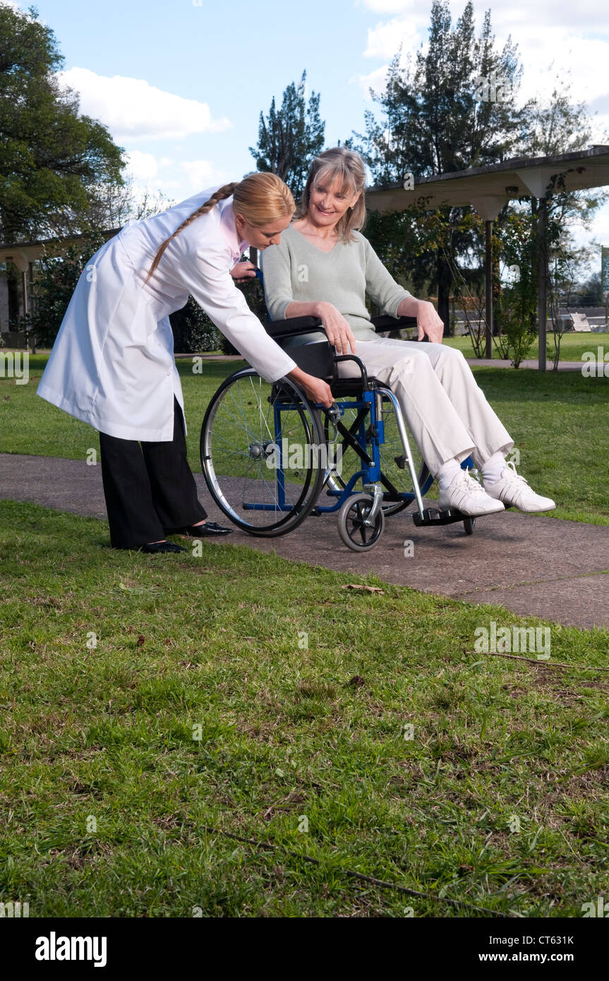 Elderly person in wheelchair hi-res stock photography and images - Alamy