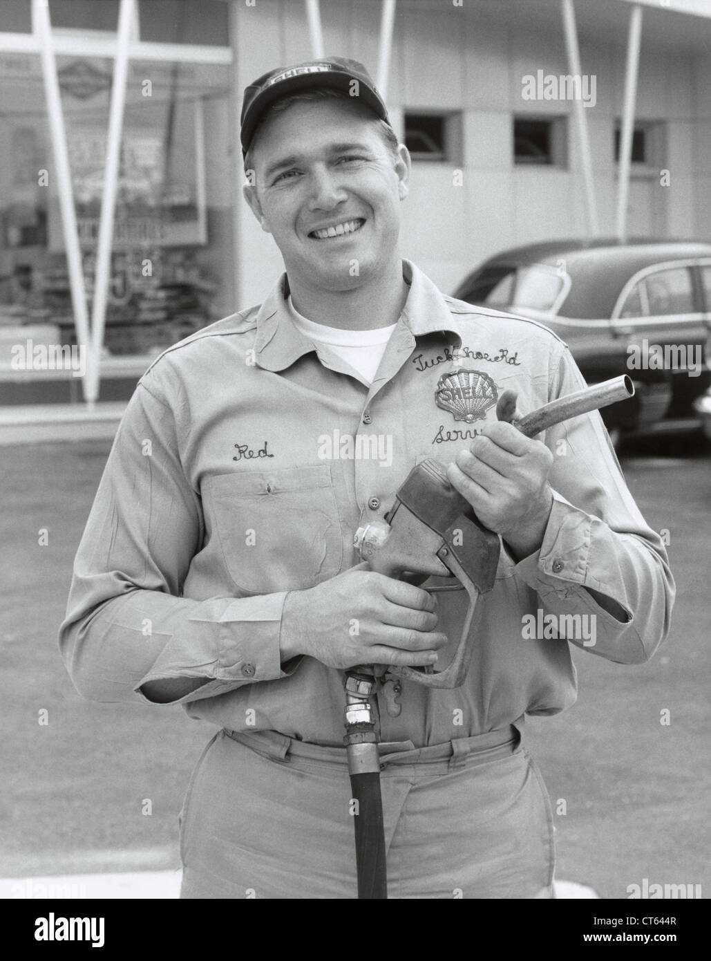 Serviceman at gas station Stock Photo