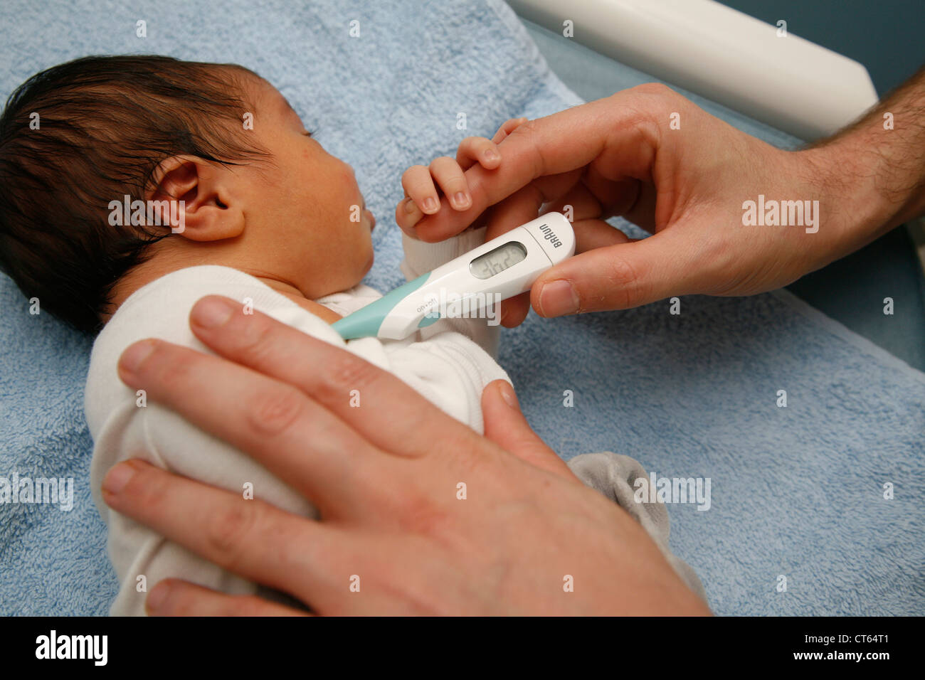 TEMPERATURE, NEWBORN BABY Stock Photo