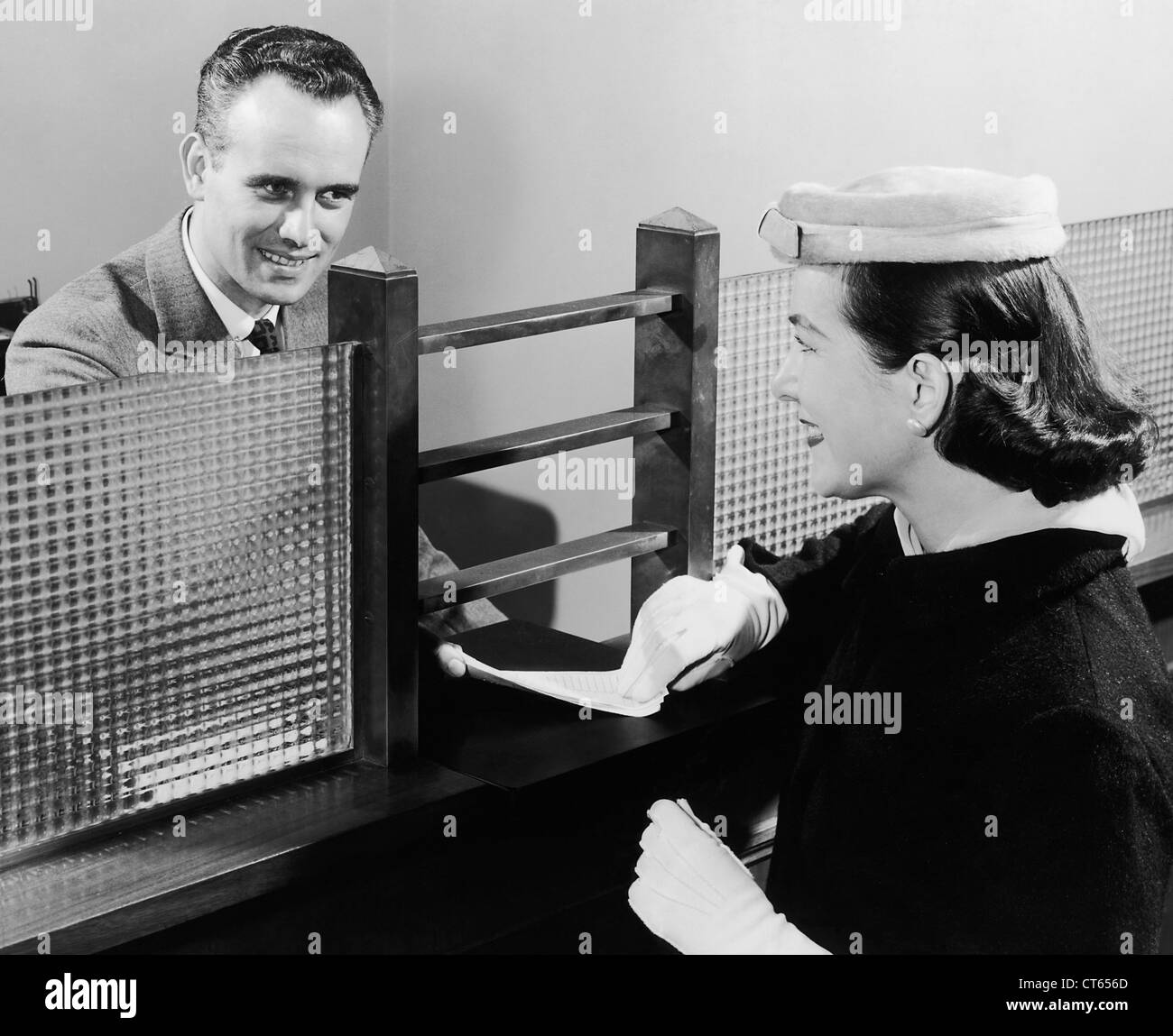 Bank teller vintage Black and White Stock Photos & Images - Alamy