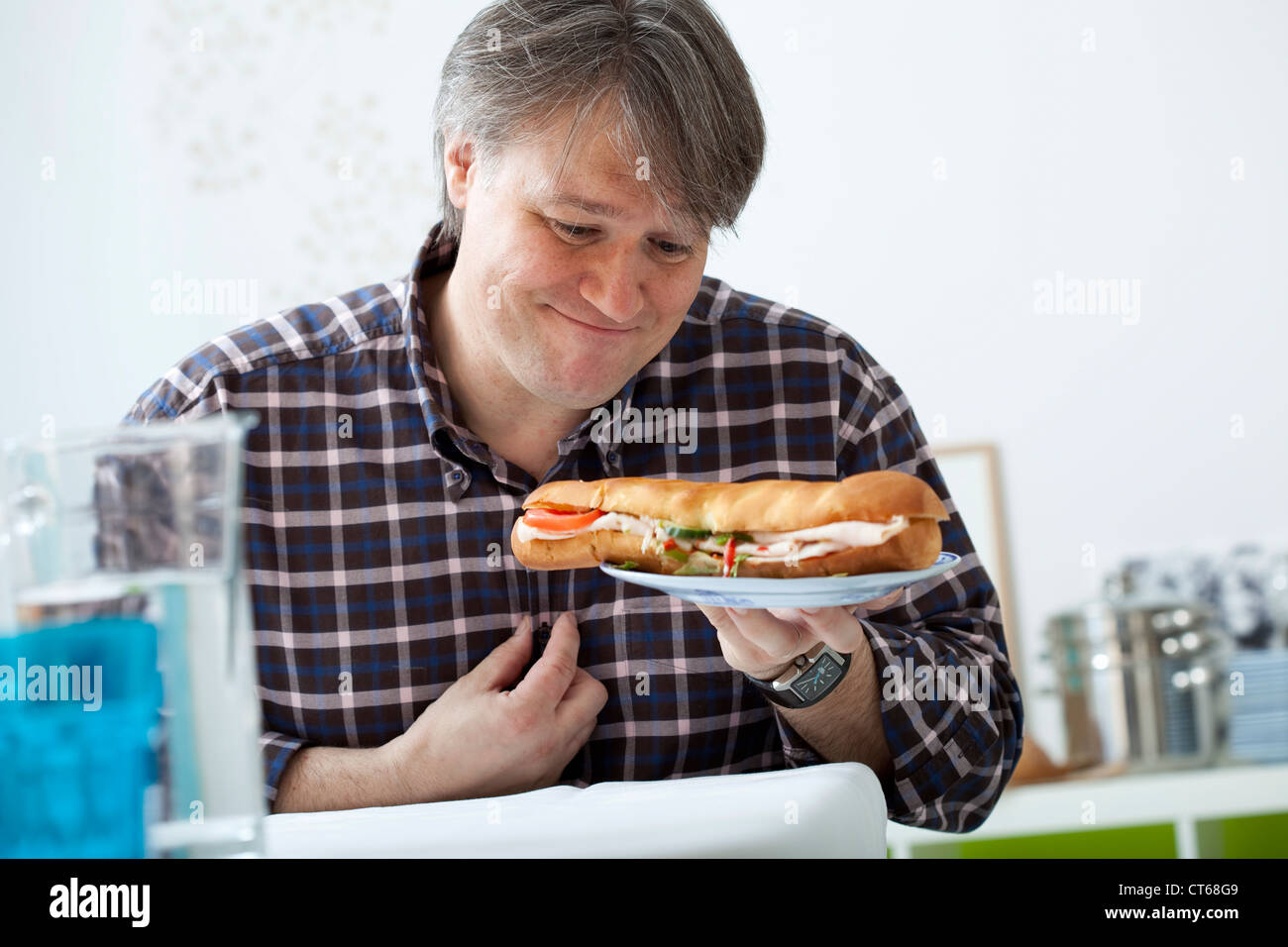 MAN EATING A SANDWICH Stock Photo Alamy
