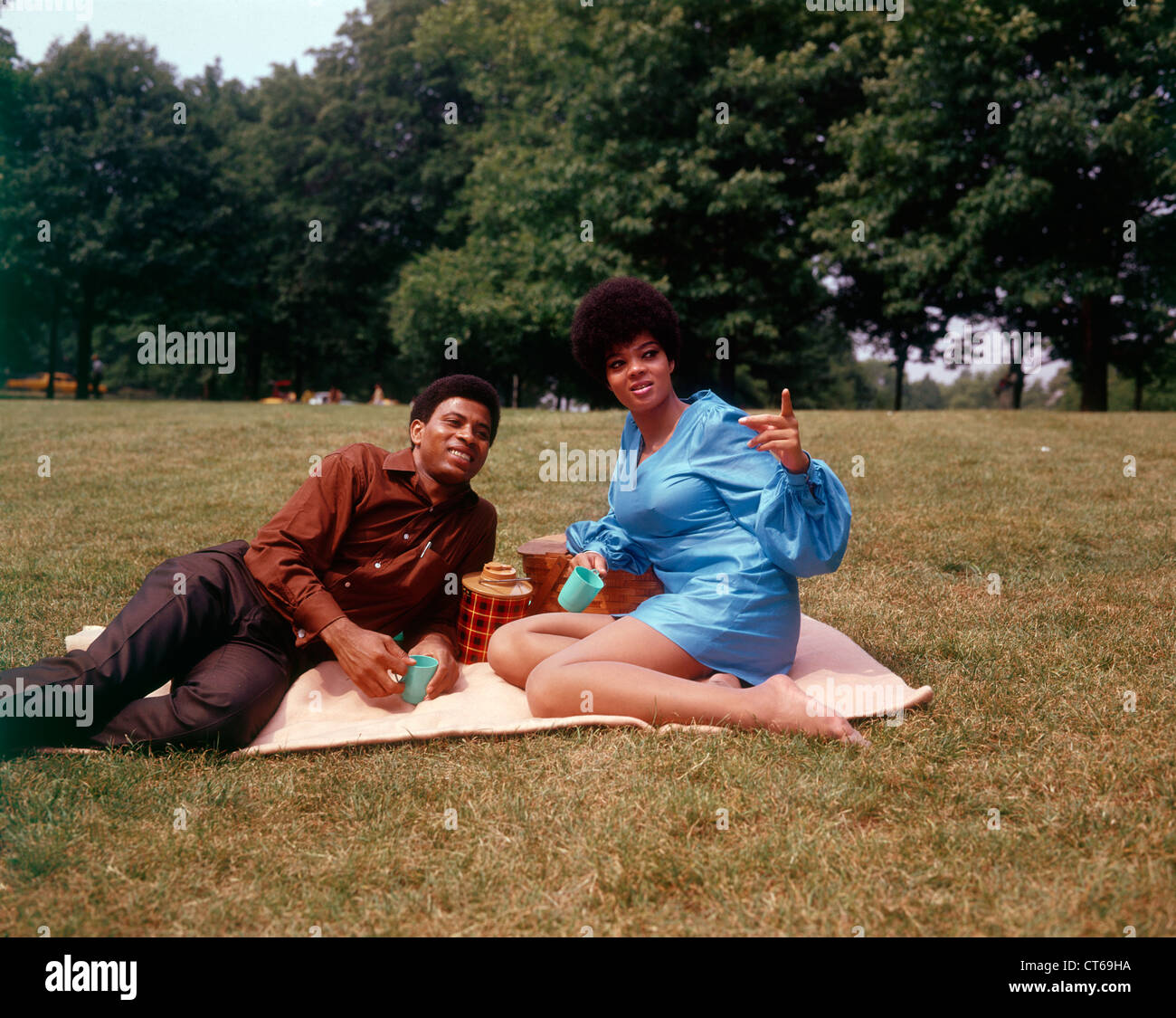 Vintage outdoor portrait of couple picnicking Stock Photo
