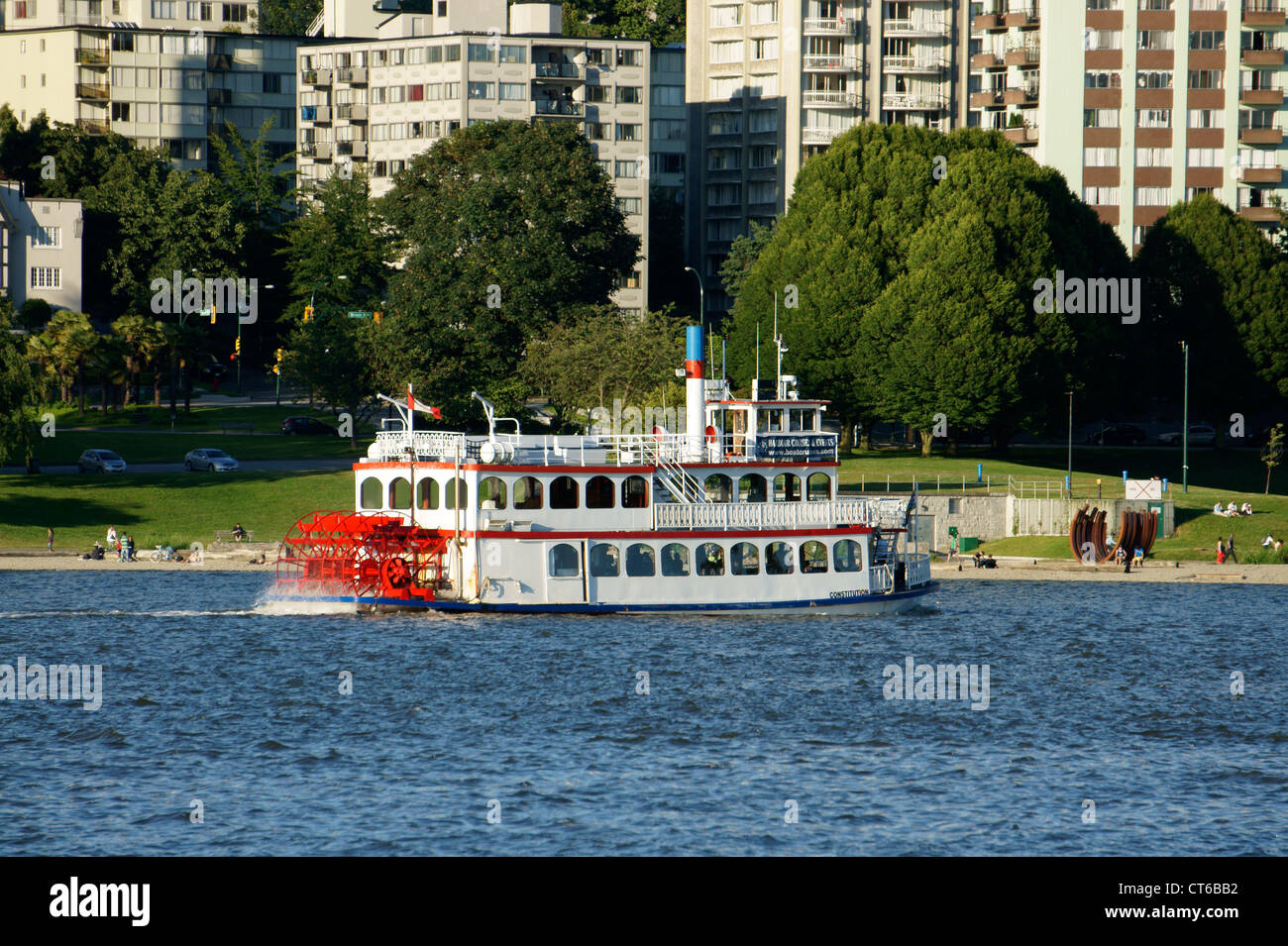 MPV Constitution paddlewheeler or sternwheeler sightseeing boat with West End skyline in back, English Bay, Vancouver, British Columbia, Canada Stock Photo