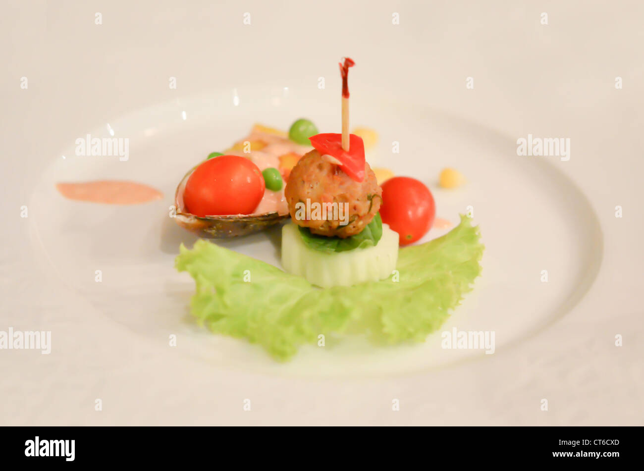 asian meat ball served with fresh vegetable on dish Stock Photo