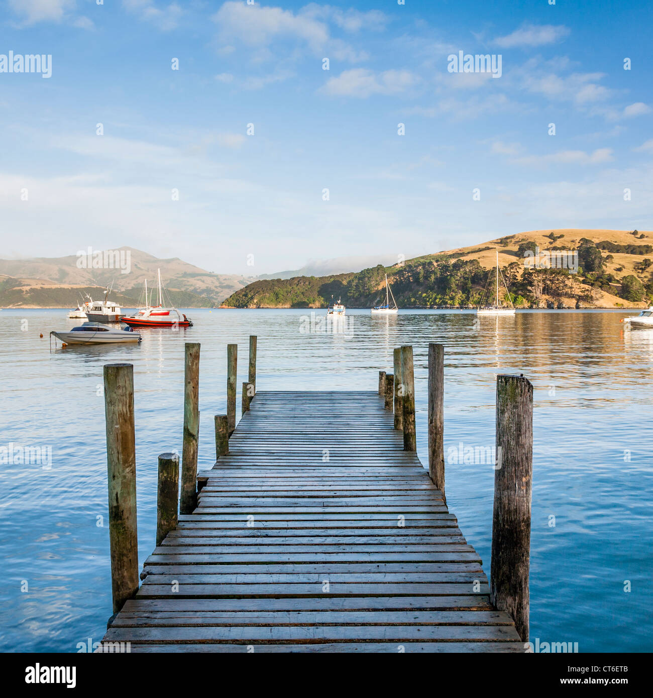 HDR image of early morning on the old jetty at Akaroa, Canterbury, New Zealand. Stock Photo