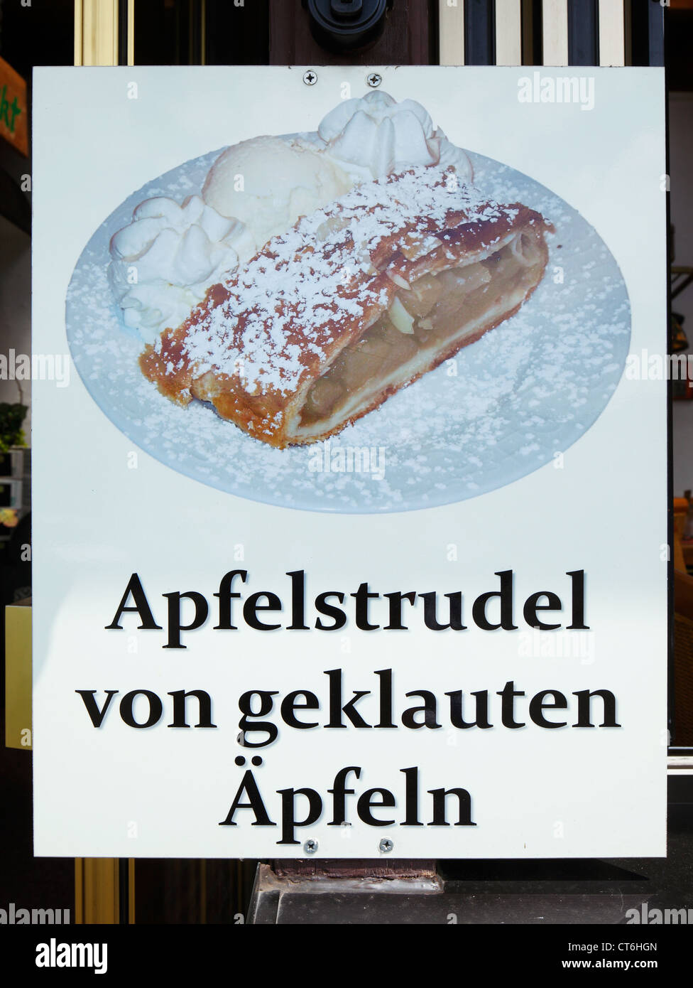 humour, food, cake, sign at a restaurant with the title 'apple strudel from pinched apples' Stock Photo