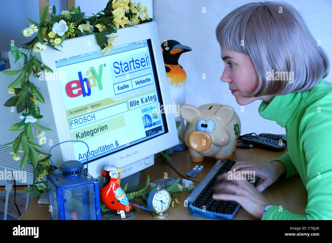Women Looking For Products Over The Internet With Ebay Stock Photo
