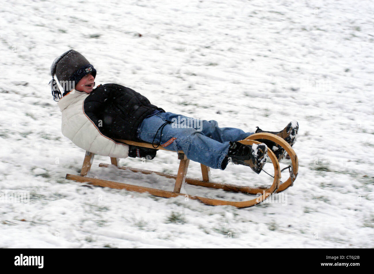 Children tobogganing, Berlin Stock Photo Alamy