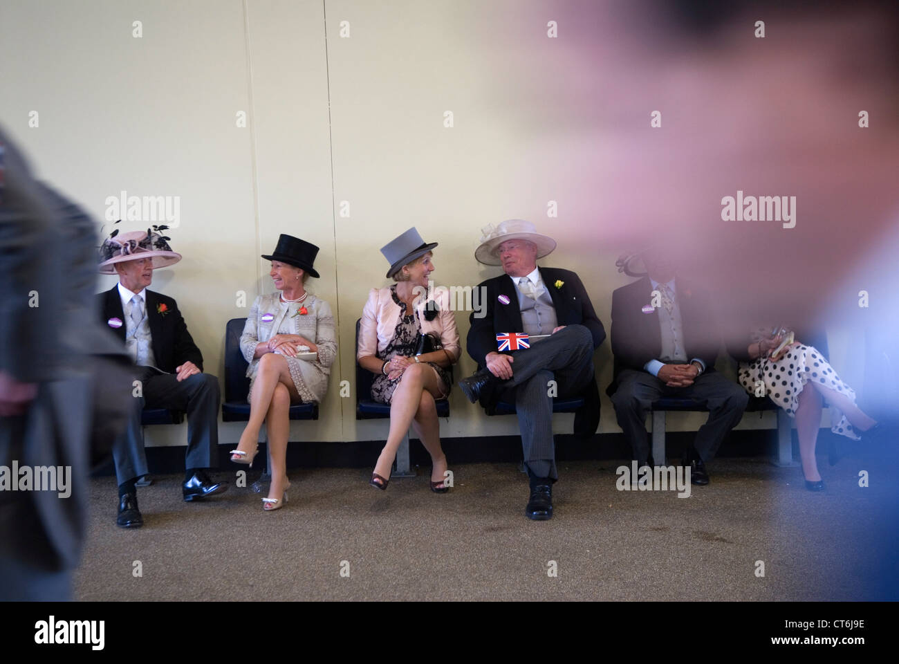 Elderly  group friends Royal Ascot horse racing Berkshire.Seniors having fun after a jolly good day at the races. 2012 2010s UK HOMER SYKES Stock Photo