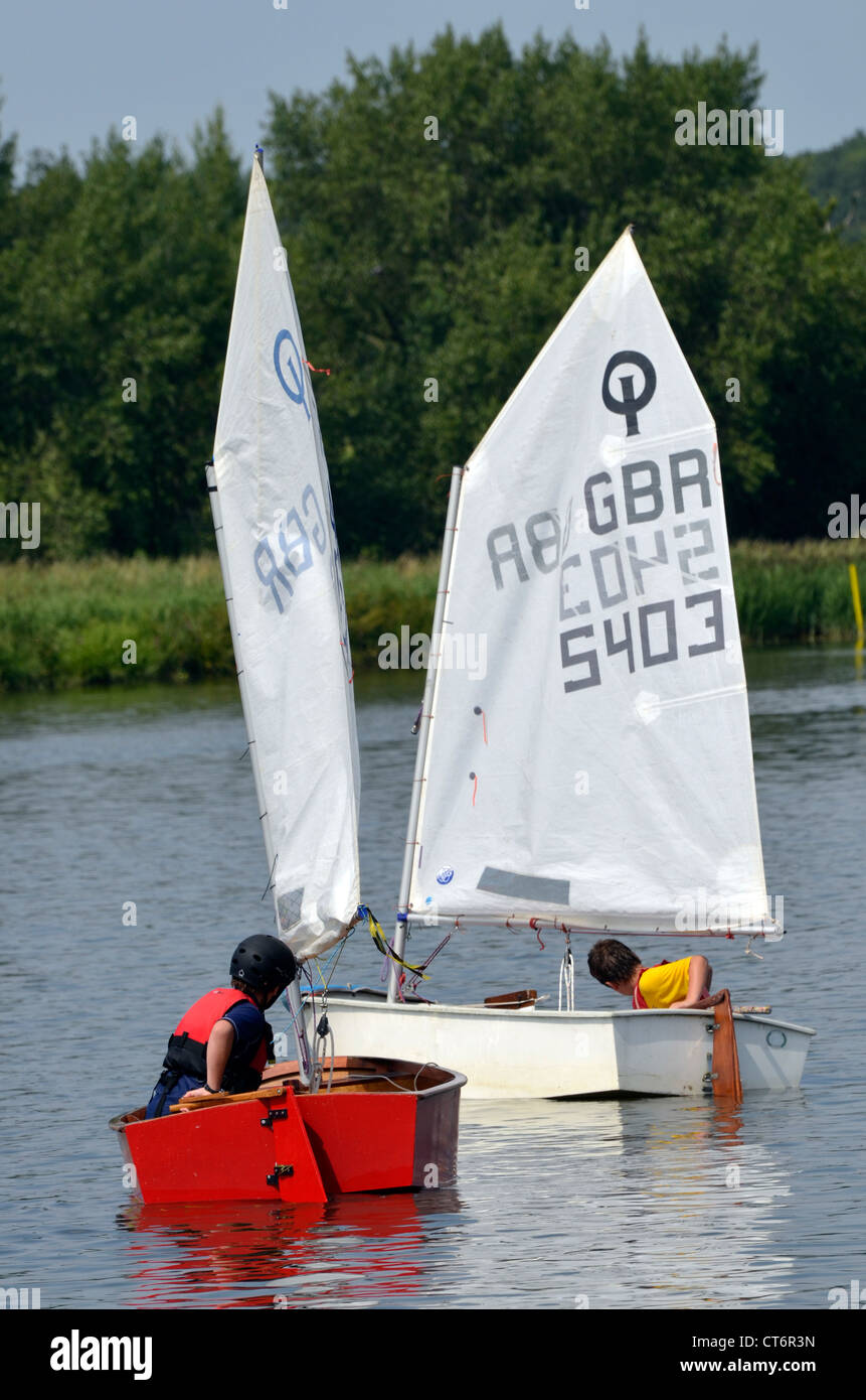 children sailing optimist dinghys Stock Photo