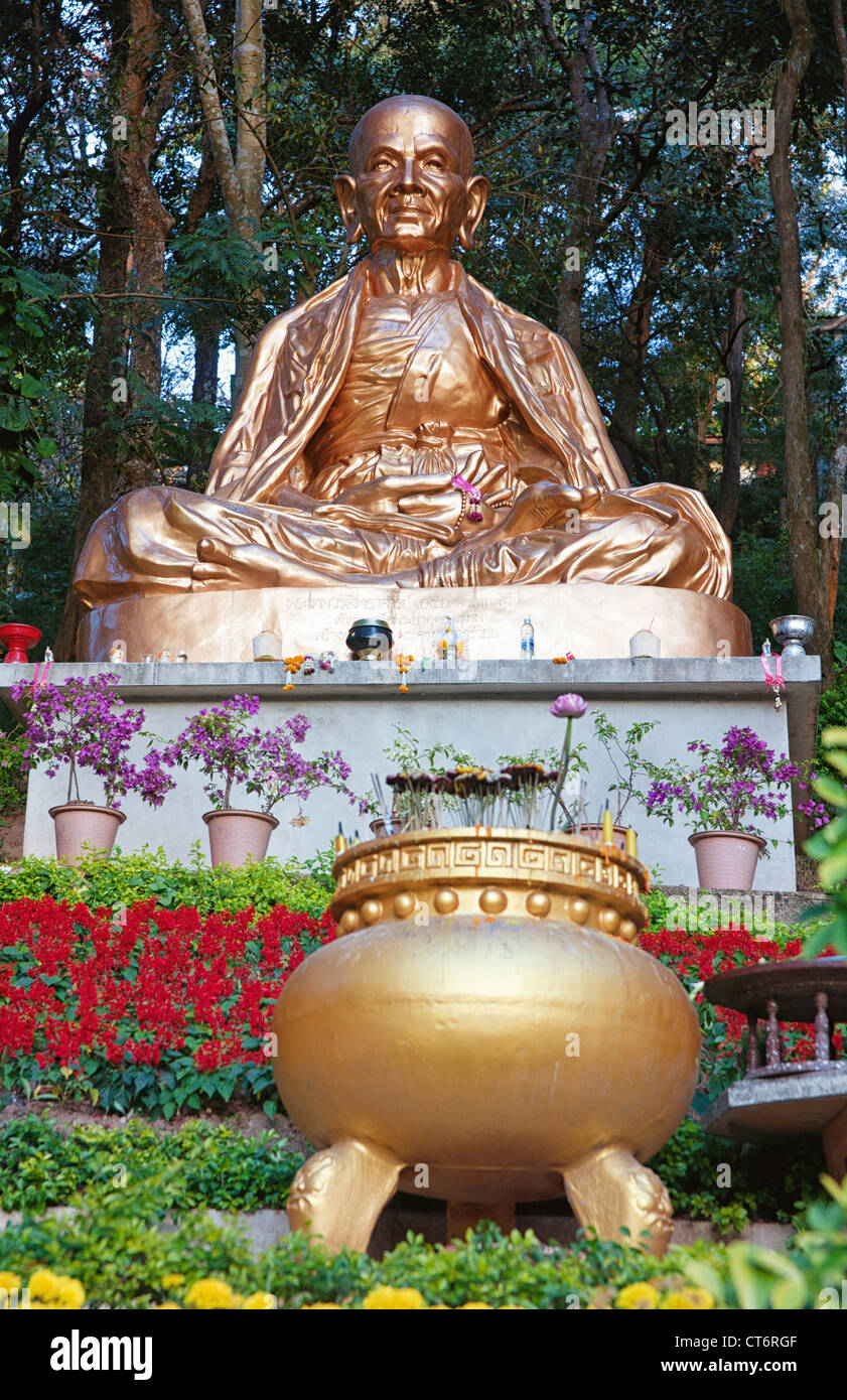 golden sitting buddha statue in chiang mai thailand Stock Photo - Alamy