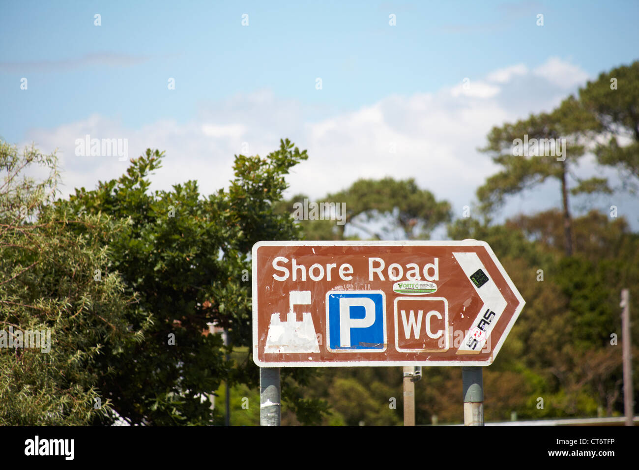 Beach car park sign pointing to Shore Road for Sandbanks, Poole, Dorset UK  in June Stock Photo