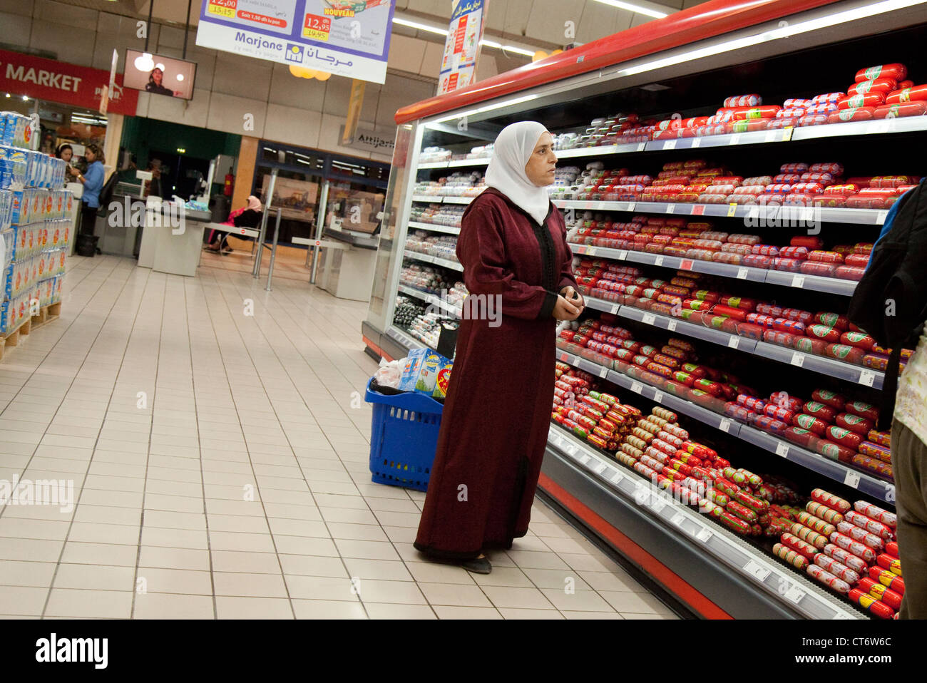 An Arab woman shopping for food in a supermarket, Taroudant, Morocco Africa Stock Photo