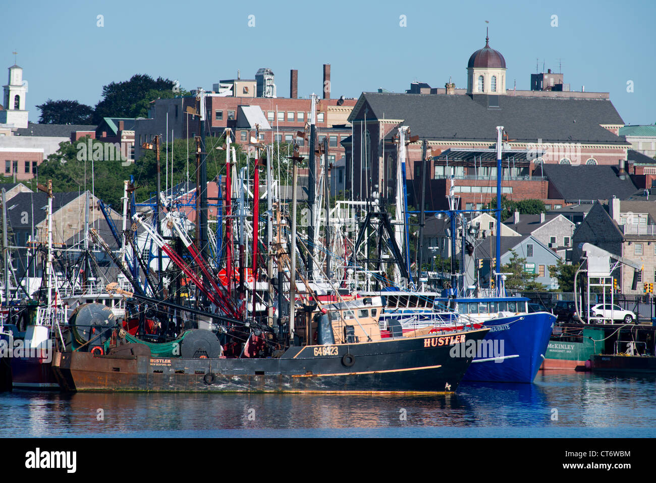 Massachusetts, New Bedford. Colorful commercial fishing boats in New