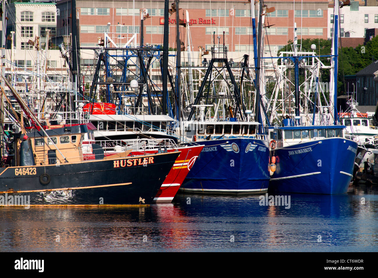 Massachusetts, New Bedford. Colorful commercial fishing boats in New
