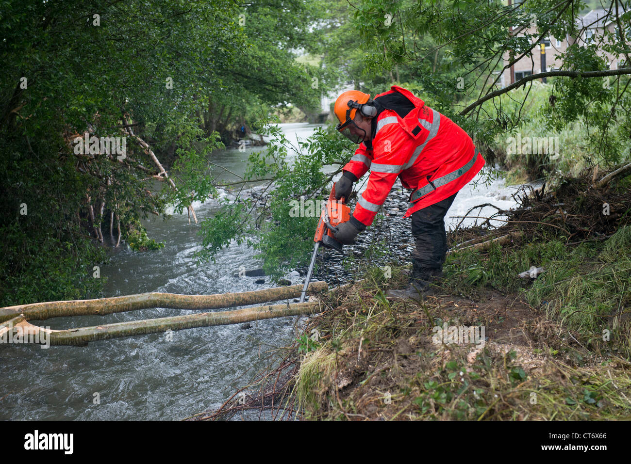 After the flash floods that hit Aberystwyth and villages a worker from