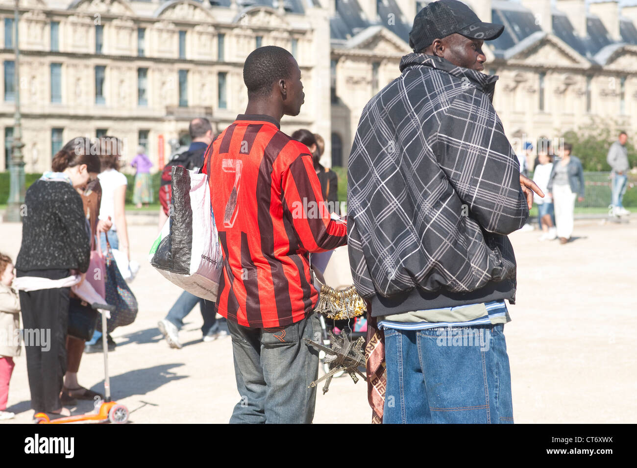Paris, France - African selling selling souvenirs in the streets Stock Photo